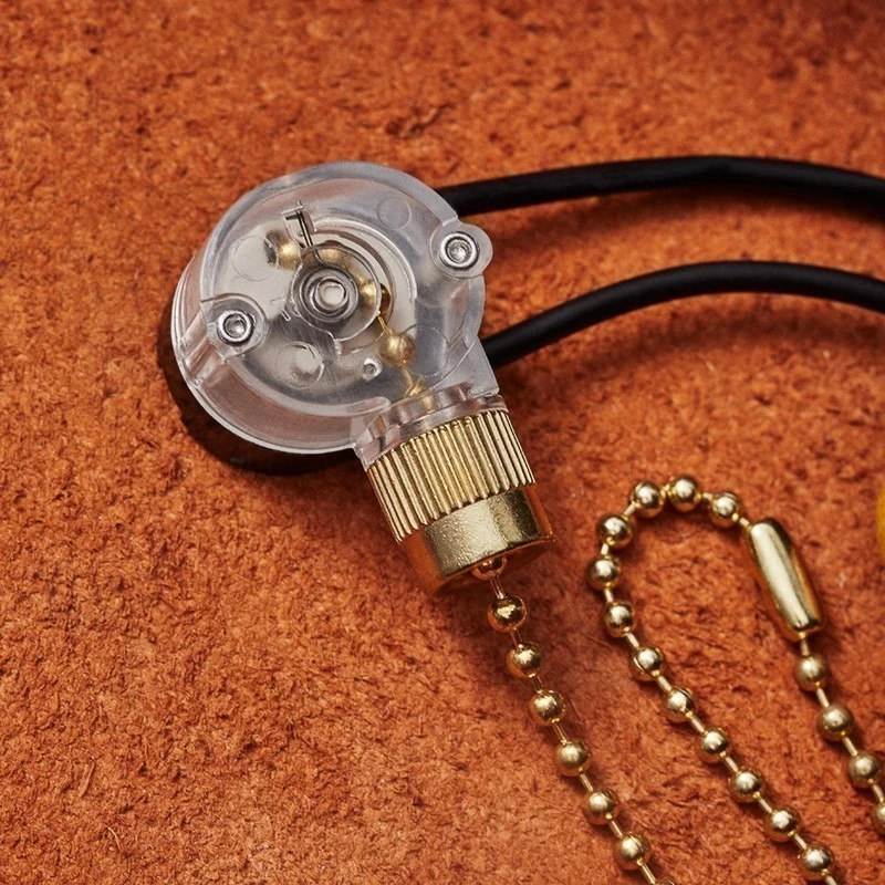 Выключатель для настенного светильника REXANT c проводом и деревянным наконечником, золотой, 1 шт.